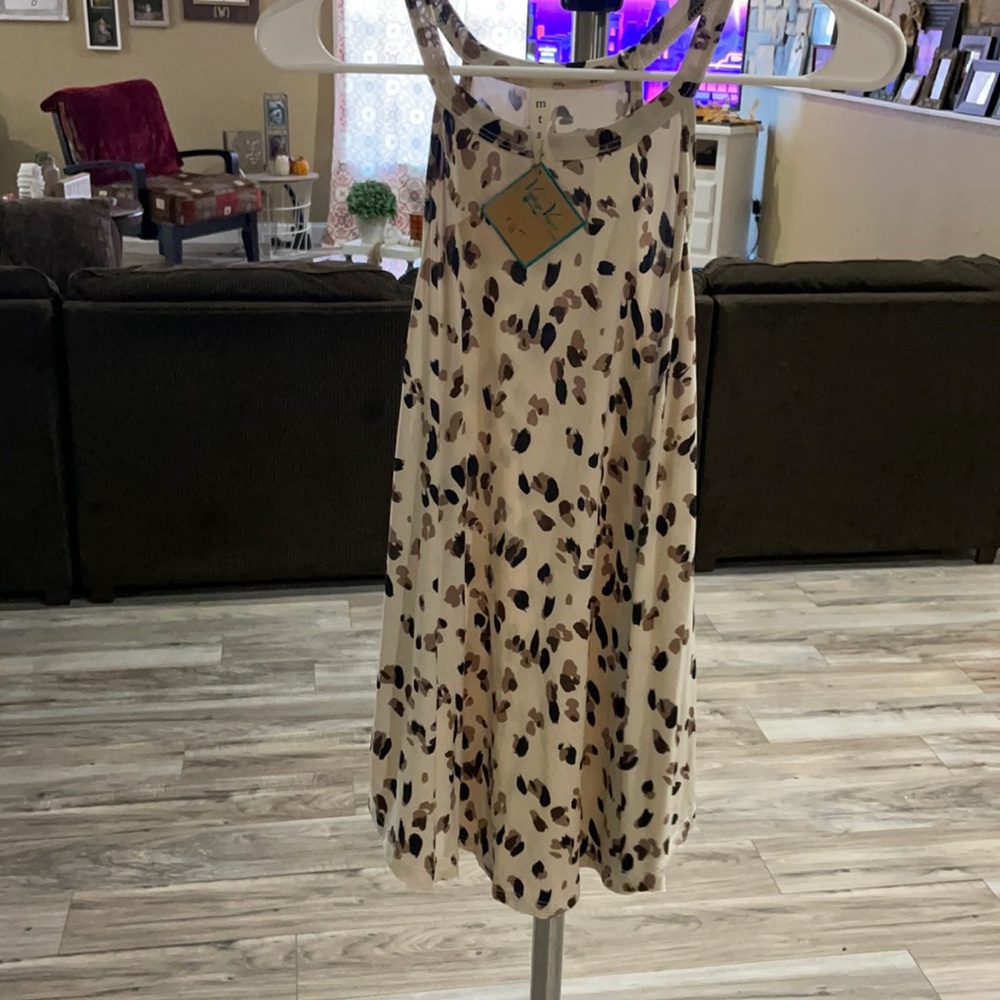 Tan and brown dot tank